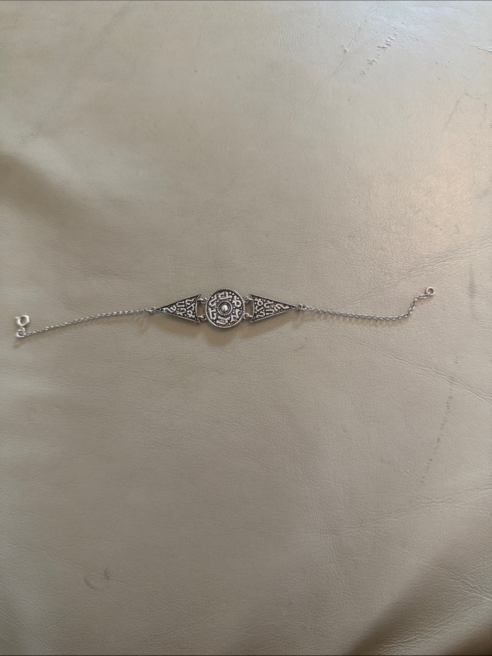 Silver (I think silver plated) bracelet